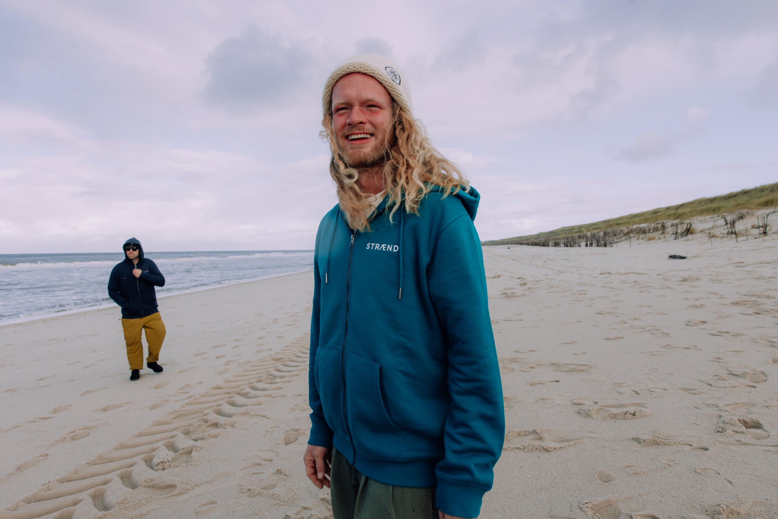 Hoodie in Pfauengrün mit Sonne in weiss, unisex