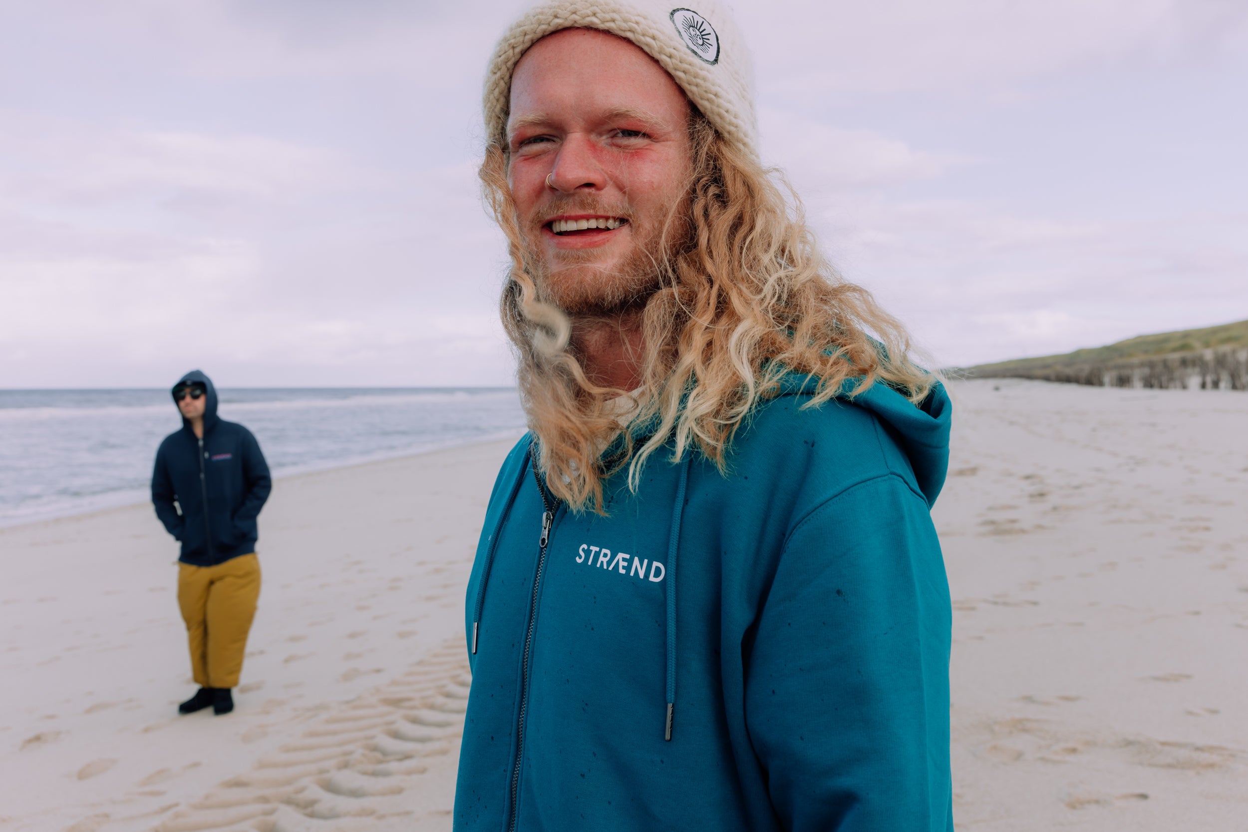 Hoodie in Pfauengrün mit Sonne in weiss, unisex