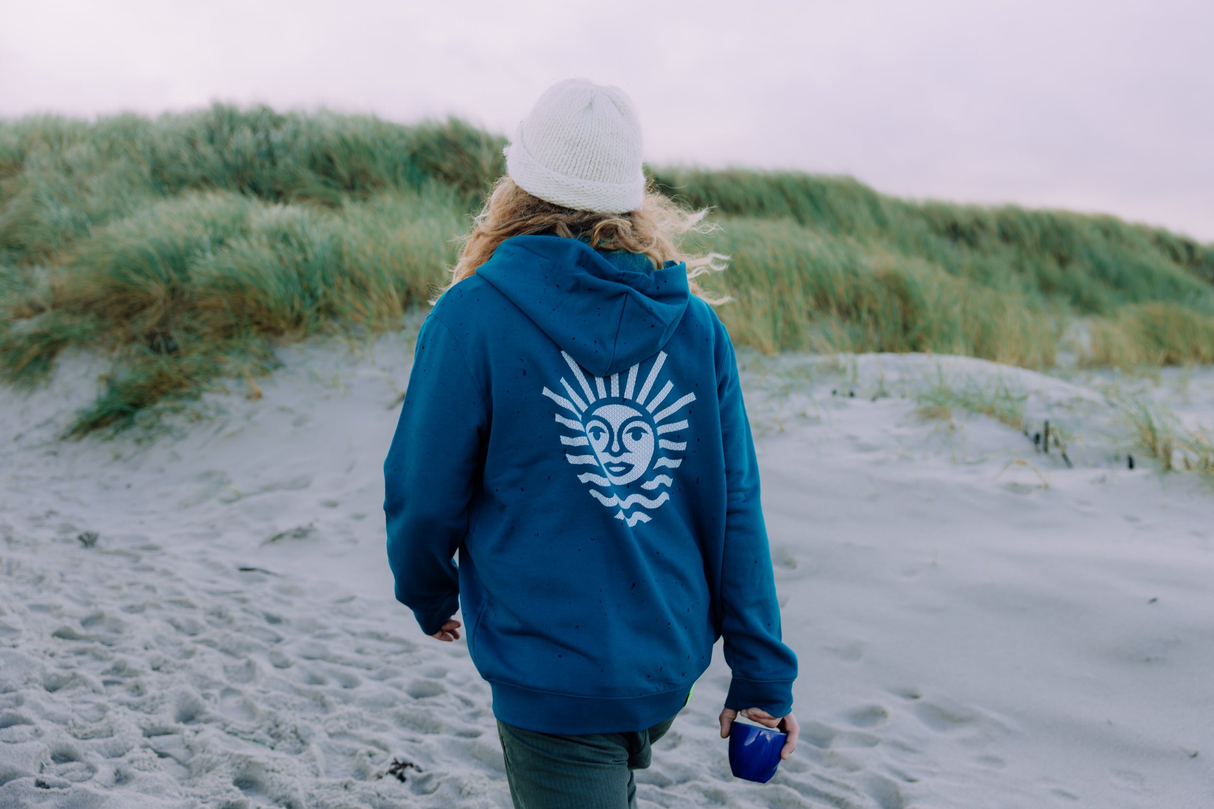 Hoodie in Pfauengrün mit Sonne in weiss, unisex