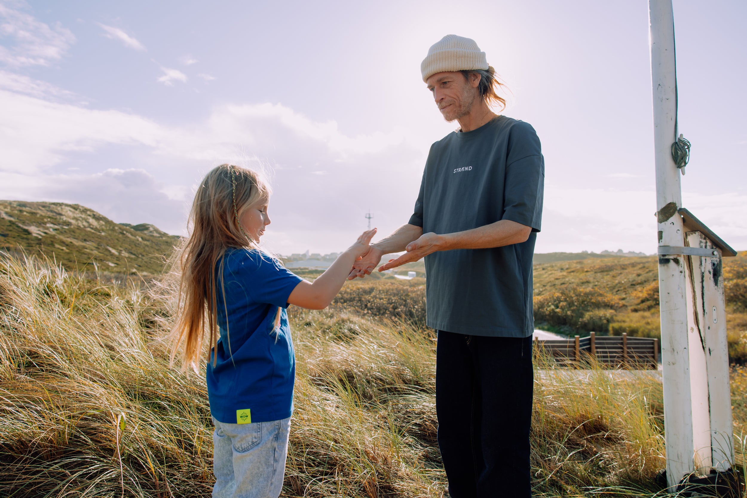T-Shirt in Grau mit weisser Sonne